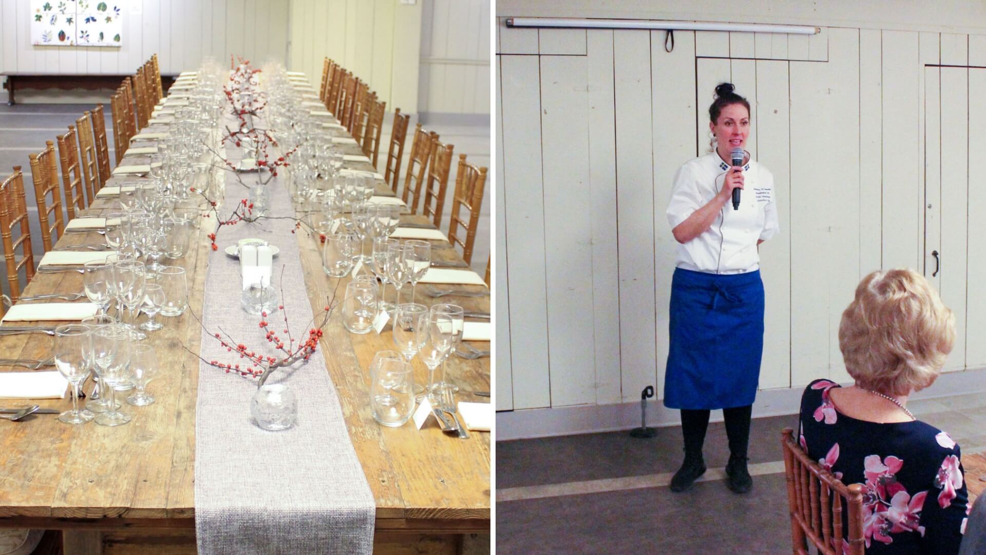 A long table is set for dining with glassware and a gray runner. On the right, a chef in a blue apron speaks into a microphone to seated guests.